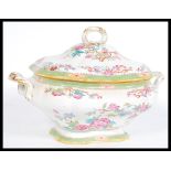 A 19th century Minton large tureen having a Chinese style floral pattern with twin shaped handles