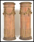 A pair of late 19th Century pedestal column plant / bust stands. Each pedestal heavily decorated