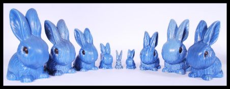 A collection of vintage ceramic SylvaC blue rabbits to include one small long eared rabbit and one