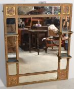 A large 19th Century gilt framed large aesthetic movement sectional wall - over mantel mirror, the