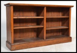 A Good Victorian oak open window lawyers bookcase being raised on plinth base with open shelves