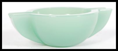 A vintage early 20th century jade coloured Peking glass ash tray bowl of typical form. Measures: 4cm