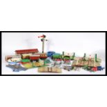 A collection of 20th century vintage toys to include a boxed penguin plastic high speed cruiser, a