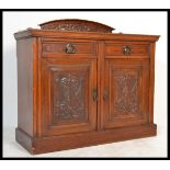 An early 20th century Edwardian tiger oak sideboard dresser   being gallery backed with a