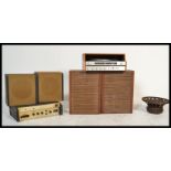 A vintage retro Audix amplifier unit along with a pair of retro speakers and a Celeston 12
