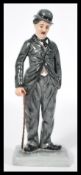 A Royal Doulton figure of Charlie Chaplin HN2771 limited edition 1053/5000. measures: 23 cm high x 9