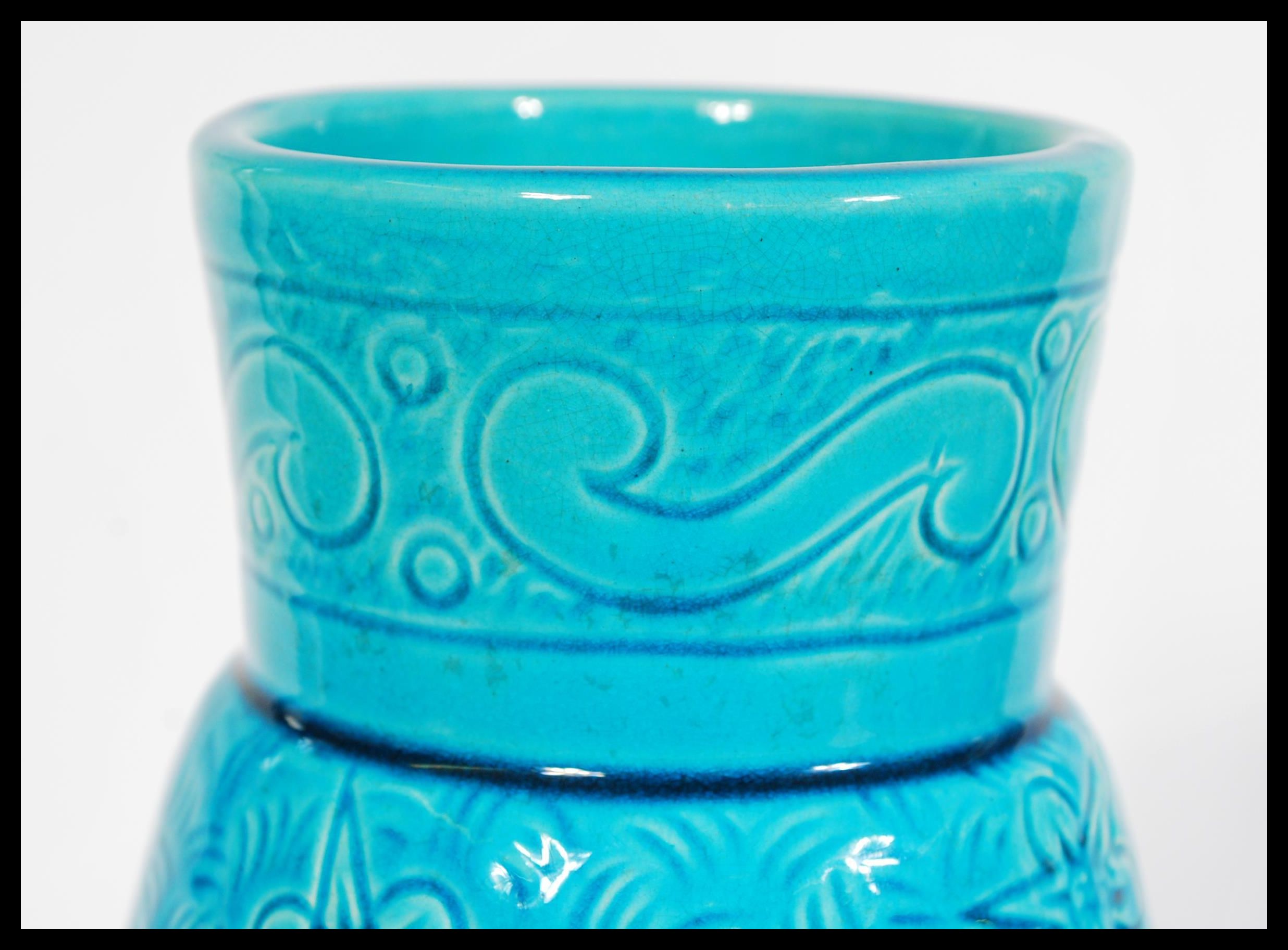 A late 19th century turquoise Burmantofts faience art pottery vase having engraved floral patterning - Image 2 of 6