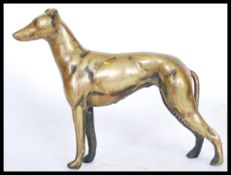 A 19th century Victorian cast bronze figurine of a greyhound modeled in an alert standing position