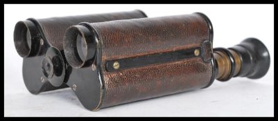 A vintage early 20th century unusual set of binoculars by Ross of London no5117 complete in original