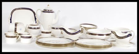 A vintage ceramic Coalport service including plates, tea cups and saucers, gravy boats, coffee