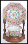 An unusual 19th century qing dynasty Chinese octagonal plate and tea bowl with detailed hand painted