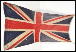 A vintage retro early 20th century paneled and stitched large union jack flag.