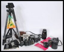 A selection of vintage 20th century film, video and digital cameras to include an Olympus skylight