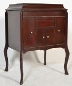 An Edwardian Concert Grande floor standing mahogany gramophone player  cabinet, with hinged cover on