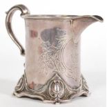 WITHDRAWN FROM SALE A 19th century Victorian silver hallmarked jug having a shaped scroll handle and