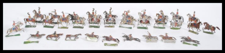 A collection of vintage semi flat lead battle figures of 19th century German cavalry soldiers,
