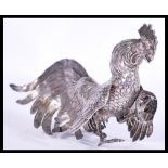 A vintage 20th century silver hallmarked large figurine of a fighting cockerel bearing London import