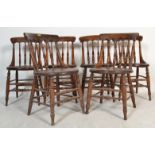 A set of 6 19th century Victorian Windsor elm and beech stick back dining chairs having solid elm