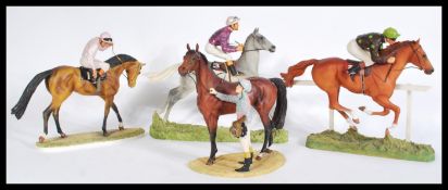 A group of four David Geentry racehorse and jockey equestrian related figures to include In The