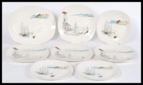 A group of four 20th century vintage plates Staffordshire china Cannes mid winter plates featuring