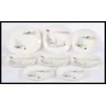 A group of four 20th century vintage plates Staffordshire china Cannes mid winter plates featuring