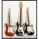 A group of three electric guitars to include two by Encore and one by Cort. Please see images.