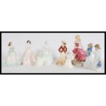 A collection of 20th century ceramic figurines of ladies to include Coalport Ladies of Fashion;