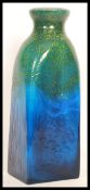 A vintage retro 20th century possible Monart studio art glass bottle vase having an iridescent