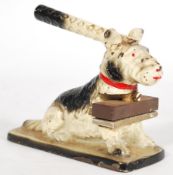 A vintage 20th century cast metal address press in the form of a dog. Please see images. Measures: