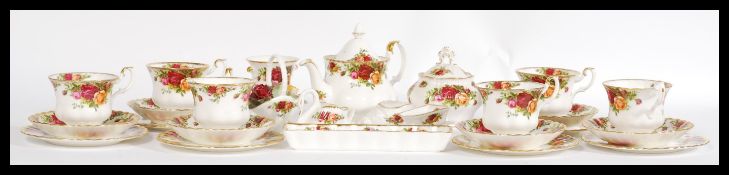 Royal Albert - A vintage 1960's Royal Albert bone China tea service in the Country Roses pattern,