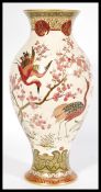 A stunning 20th Century tall cloisonne vase in the Chinese style, decorated profusely with