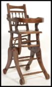 A late Victorian / early Edwardian mahogany  childs high chair with panel seat and back rest. The