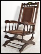 A 19th Century Victorian mahogany aesthetic movement Boston Rocker - American Rocking chair.