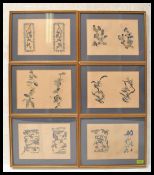 A group of six 19th century Japanese framed embroidered sheets including blue and white floral