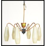 A retro 20th Century six branch chandelier, Sputnik Atomic style having swirled arms with fitted