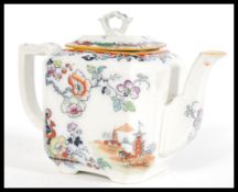 A 19th century Masons teapot having a chinoiserie pattern featuring Chinese pictorial scenes and