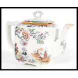 A 19th century Masons teapot having a chinoiserie pattern featuring Chinese pictorial scenes and