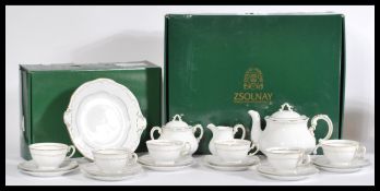 A vintage boxed Zsolnay Hungarian ceramic tea service consisting of cup saucers and side plates,