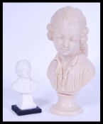 Two vintage 20th century busts one resin and one plaster depicting Mozart and Schubert. Please see