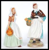 Two Royal Doulton ceramic figurines comprising of Country Lass HN1991 and The Milkmaid HN2057.