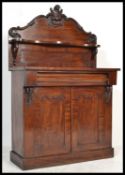A 19th Century Victorian mahogany chiffonier having a single frieze drawer above double cupboard