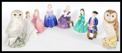 A group of seven Royal Doulton ceramic figures to include HN2183, HN1368, HN1370, HN3036, HN2236,