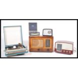A collection of vintage 20th century retro music players to include, a Dansette gem radio, a HMV