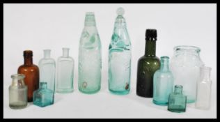 A collection of named vintage 20th century bottles to include Sanaqua Waters, Ball & Pinnell