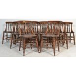 A long run /  set of 12 19th century Victorian Windsor elm and beech stick back dining chairs having