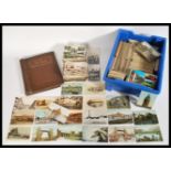 A large collection of assorted Edwardian and later 20th century postcards. Various topographical