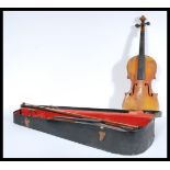 A 19th century cased violin with two bows one with horse hair with both having mother of pearl inlay