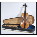 A 19th century Victorian walnut violin with a horse hair bow with mother of pearl inlay to the frog,