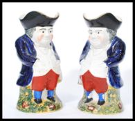A pair of 19th century Victorian Staffordshire Tob