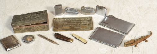 A good collection of vintage cigarette lighters and cases to include silver hallmarked damaged case,